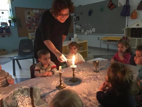 Dalia lighting Shabbos candles